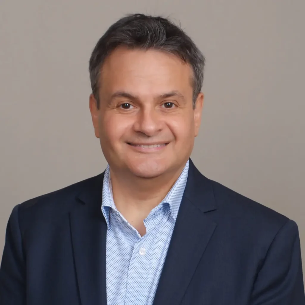 headshot of Alex Karavousanos